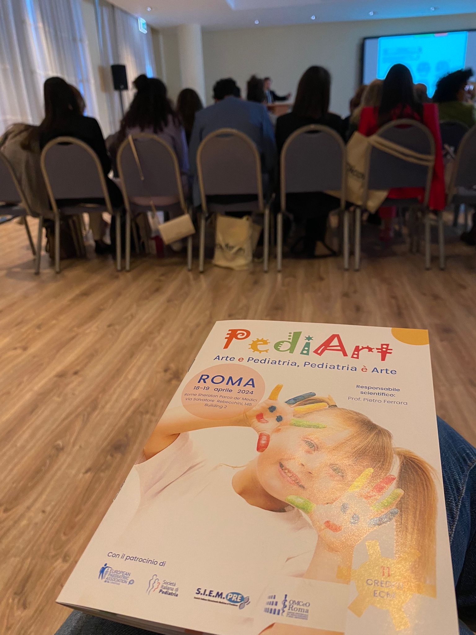 Programma di PediArt in sala durante il congresso